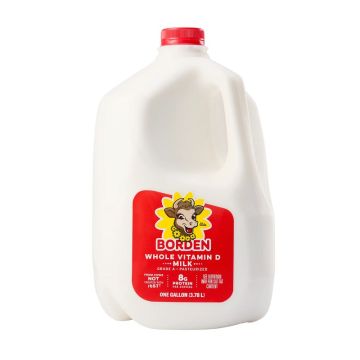 Glass and pitcher of Vitamin D White Milk