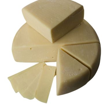 Sliced Wheel of Kasseri Cheese